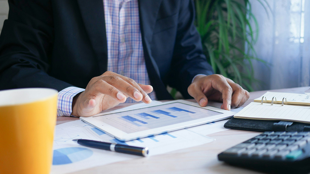Close up of desk with charts and graphs