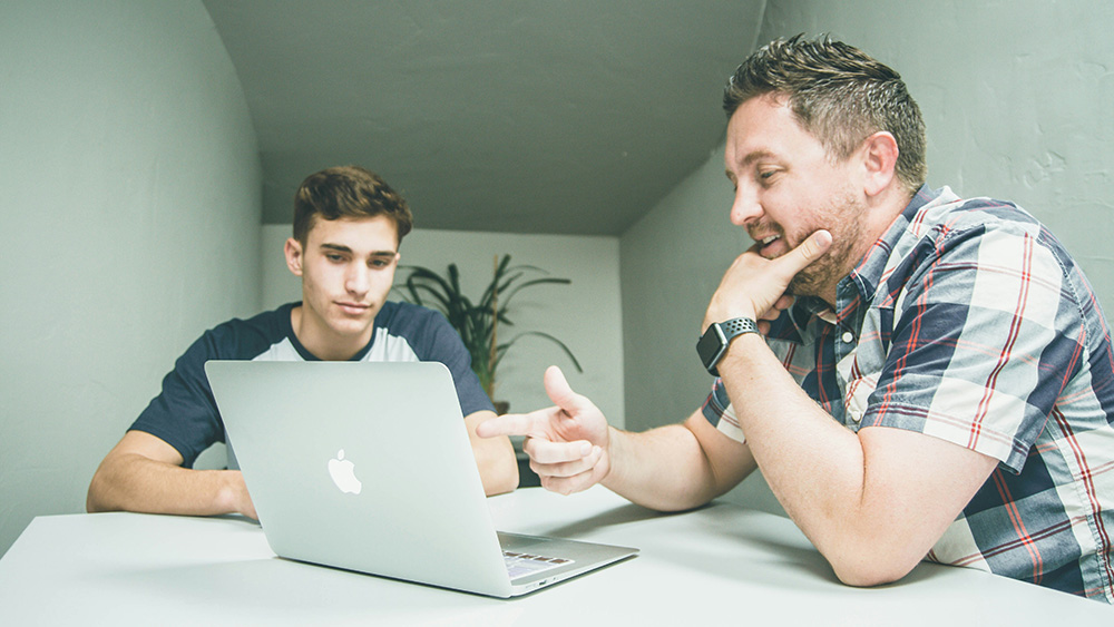 Person presenting to another