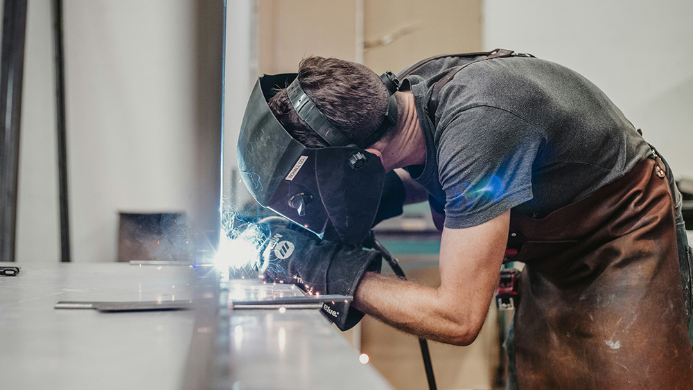 Person using grinder
