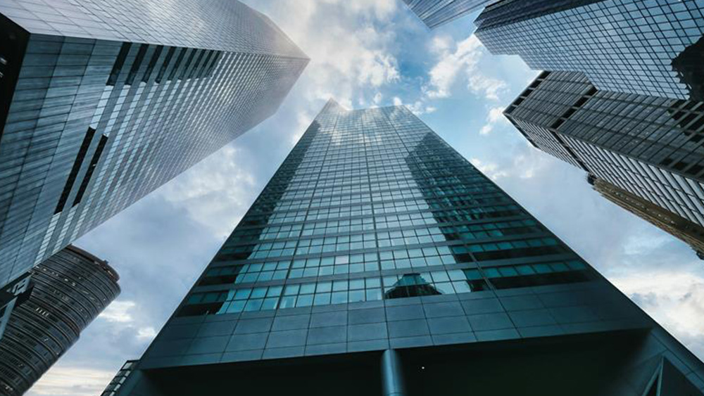 Looking up at skyscrapers