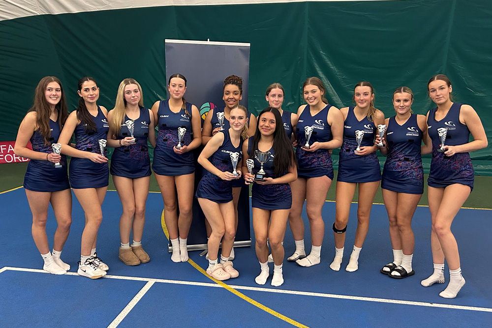 Netball team with Welsh Champions trophy at Presidents Cup