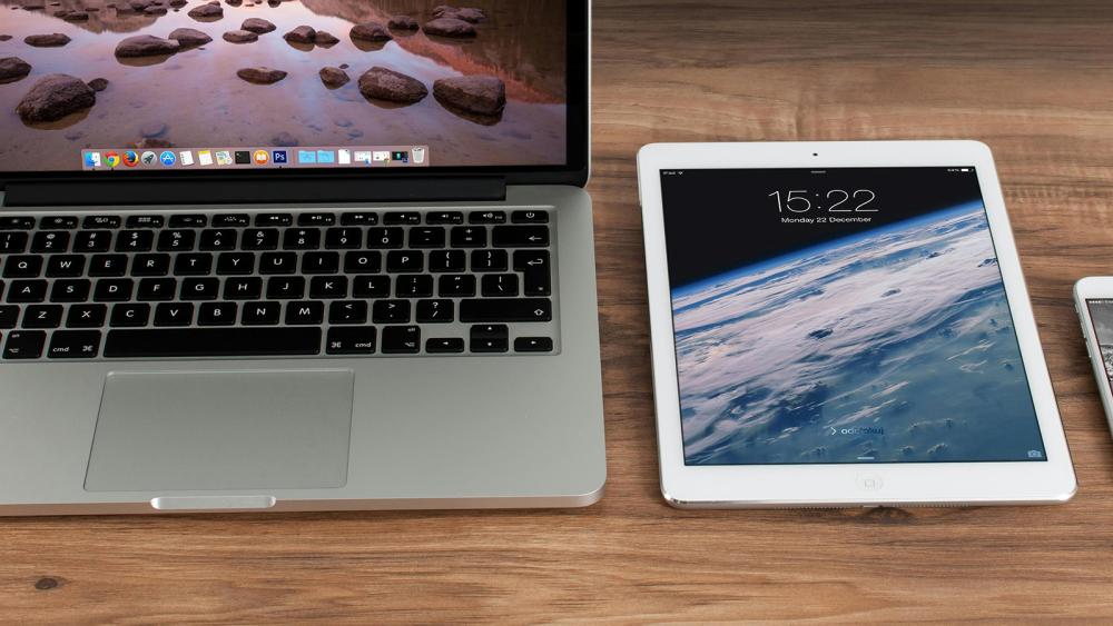 laptop, tablet and phone on a table