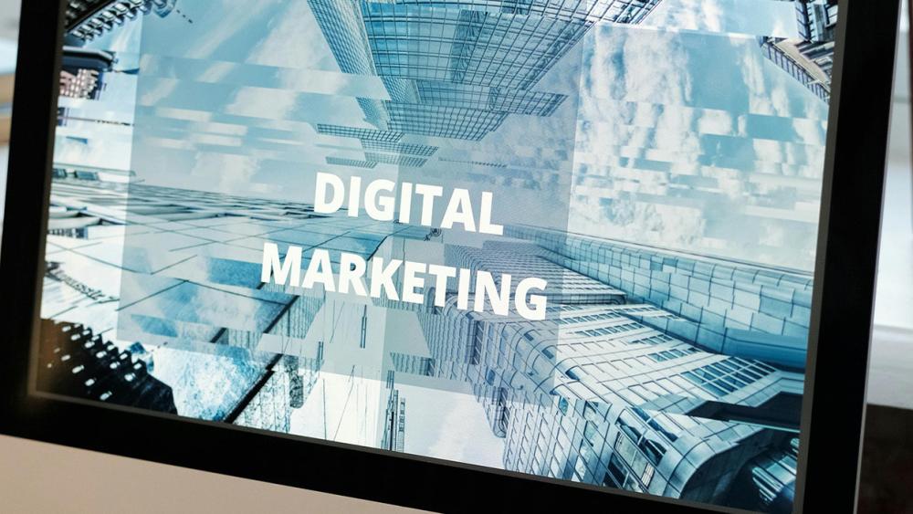 two students in lab coats in a laboratory