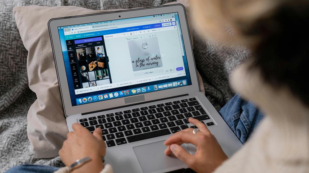 two students in lab coats in a laboratory