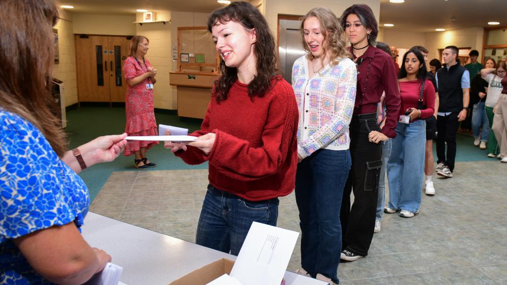 a student being handed her results 