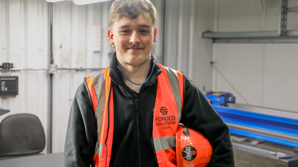 Degree apprentice Lewys Brill pictured in his workplace.