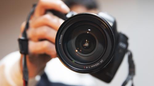 Hand holding camera