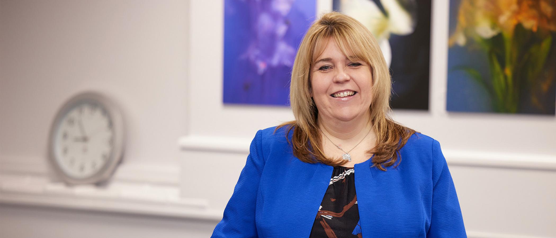 A women smiling in an office