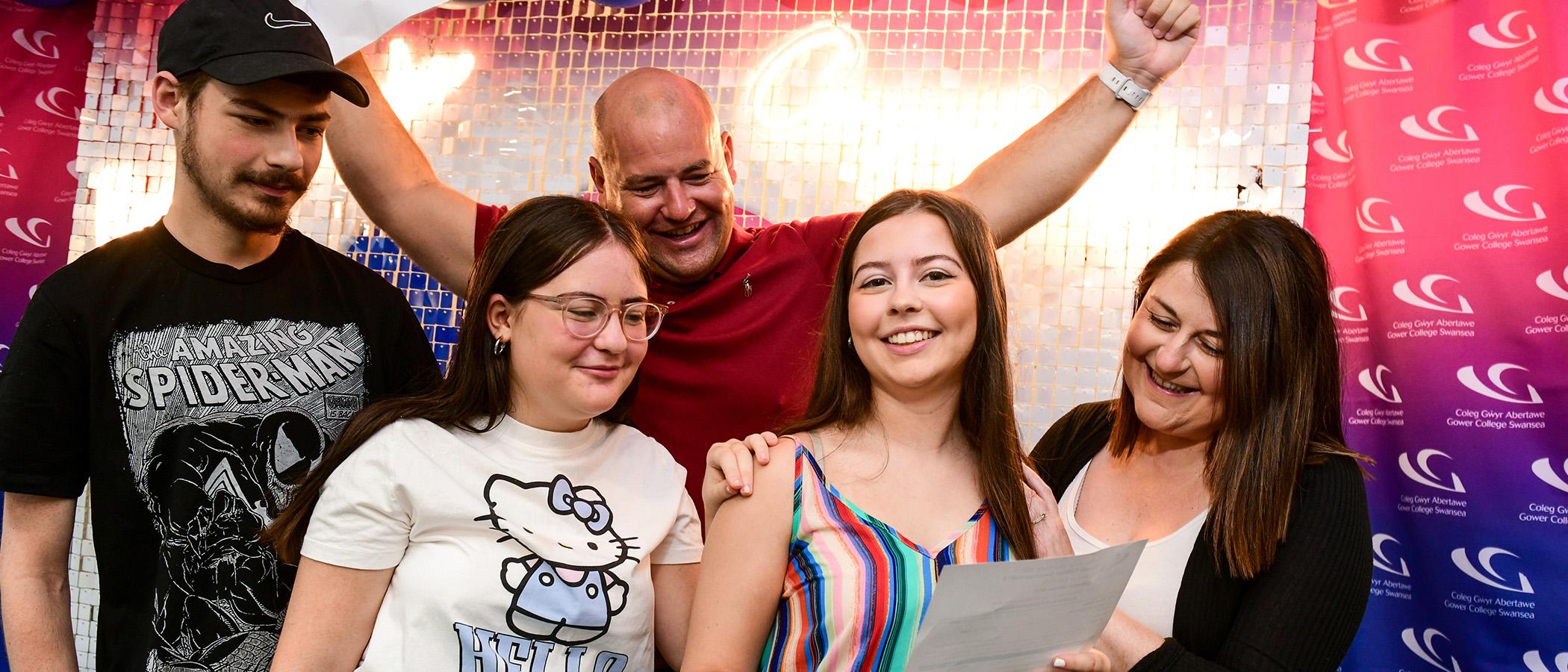 Student on A Level results day celebrating with family