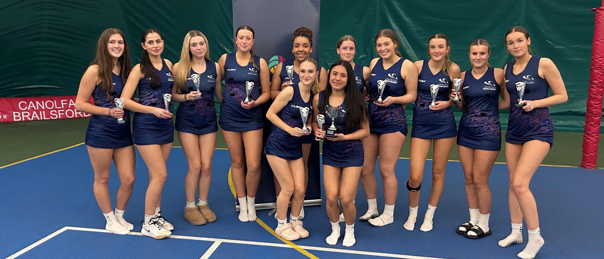 Netball team with Welsh Champions trophy at Presidents Cup