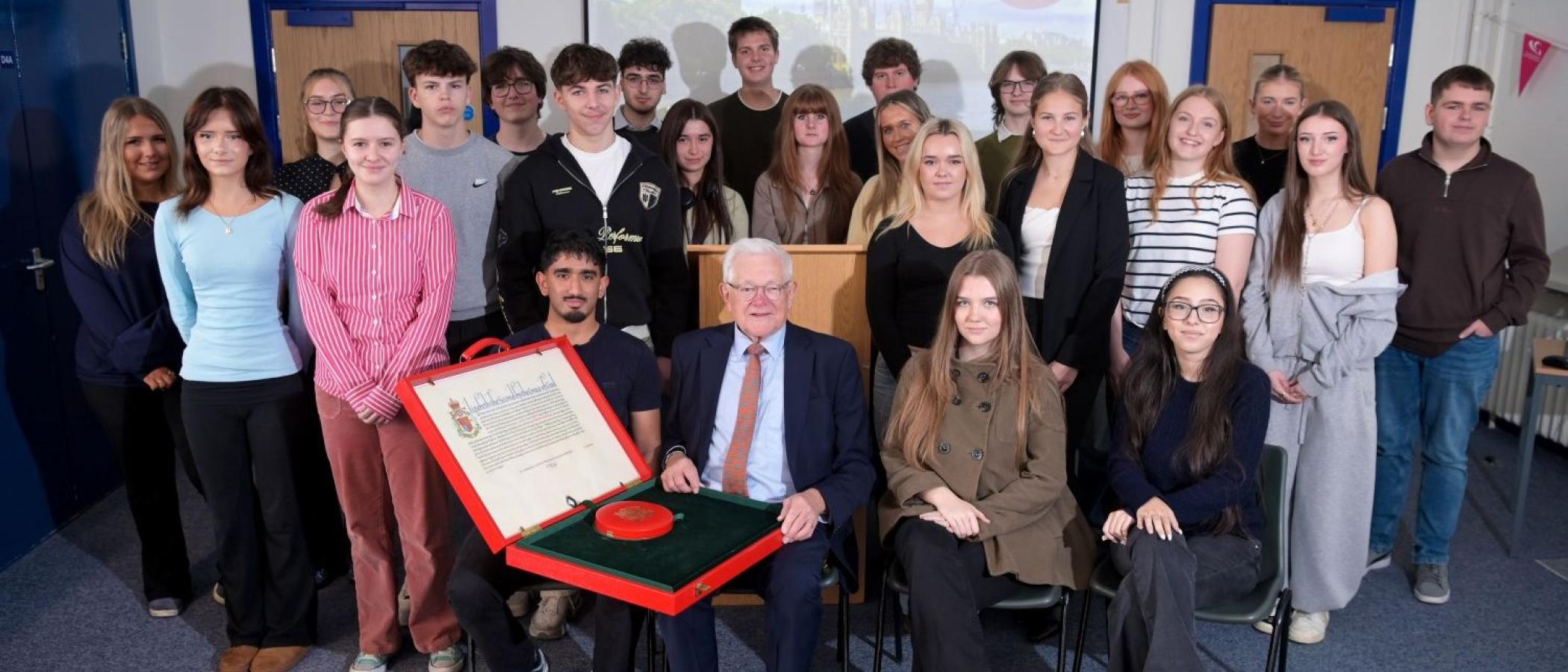 Students and staff with the Lord German OBE