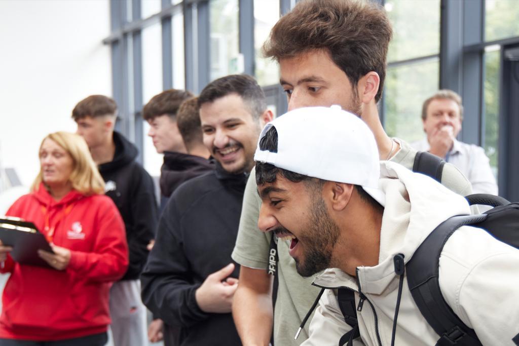 Students laughing at event