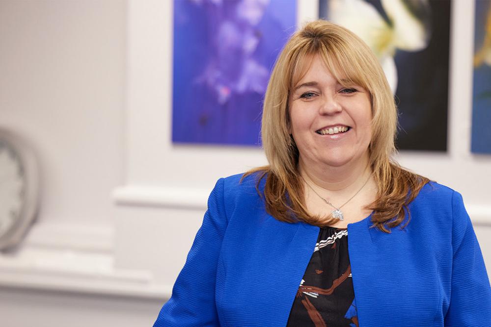 A women smiling in an office