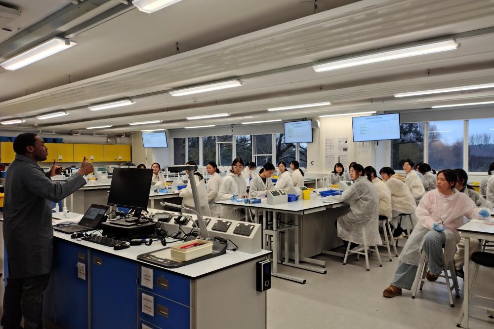 International students in science class