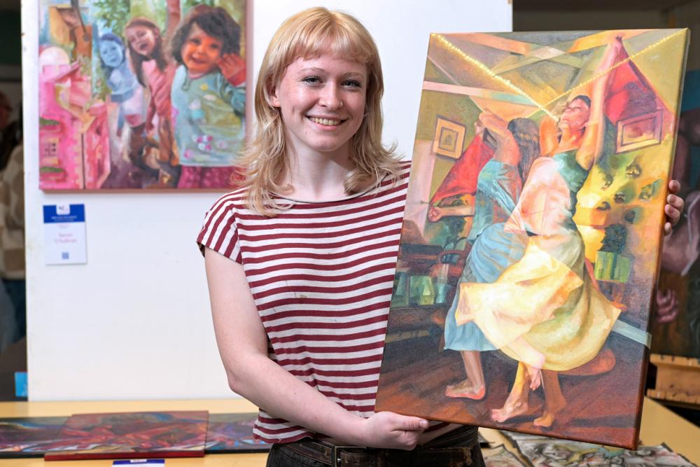 Seren O'Sullivan shows off her end of year fine art piece