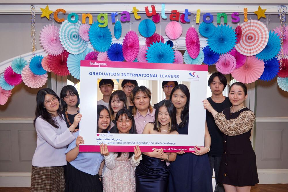 International graduates group photo